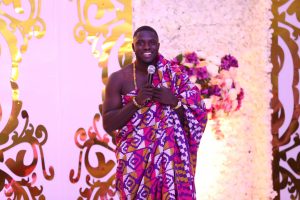 Philip Frimpong in traditional Kente wrap 